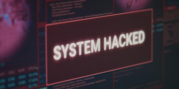 computer-monitor-showing-hacked-system-alert-message-flashing-screen-dealing-with-hacking-cyber-crime-attack-display-with-security-breach-warning-malware-threat-close-up